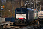 D-BRLL 185 408-2 zog am 21.02.25 ihren KLV-Güterzug aus dem Lübeck-Dänischburger Gbf (ALD G) in richtung des Lübecker Hbf (AL).