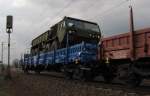 Ein Militrfahrzeug auf einem Transportwagen, in einem Militrzug Richtung Wiesbaden, bei Erbach (Rheingau); 30.03.2011