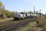 DB DE 12 (92 80 4125 009-5 D-NXRL) mit Kesselwagen Richtung Seelze, am 15.04.2025 in Hannover Misburg.