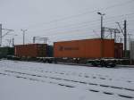 Deutscher Containerwagen im polnischen Grenzbahnhof Szczecin Gumience am 12.Januar 2013.
