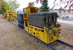 Kleinlokomotive für den Bergbau mit Lore.