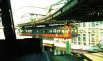 Wuppertaler Schwebebahn__Wagen 12 bei der Ausfahrt aus der Station.__06-1984