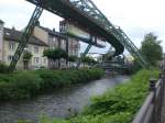 Wuppertaler Schwebebahn in Richtung Bahnhof Oberbarmen nahe vom Haltepunkt Barmen Werther Brcke.(6.7.2012)