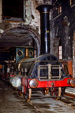 Beim Betrachten dieser Aufnahme der Dampflok  Die Pfalz  der Bauart Crampton im Jahre 1980 im historischen Pfalzbahnschuppen, genutzt von der DGEG in Neustadt an der Weinstraße, könnte man