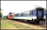 Lok und Wagenzug am 26.6.1993 im Bahnhof Bad Rappenau. Am Zugende lief der IR Wagen Bimdz 518-084-95064-2 mit.