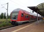 RB nach Leipzig Hbf bei ihrem letzten Halt am Messebahnhof am 10.7.08