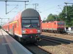 Der  Uni-Express  von Potsdam kommt in seinem Zielbahnhof Golm an, whrend RB 20 von Hennigsdorf nach Potsdam abfhrt.