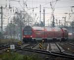 DABbuzfa 760 als RE 18590 von Berlin Hbf(tief)nach Warnemnde bei der Einfahrt im Rostocker Hbf.25.10.2014 