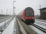 Hier ein RE3 nach Stralsund, bei der Ausfahrt am 24.12.2009 aus Angerm�nde.