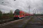 Hier eine RB14 (RB92919) von Berlin Hbf. nach Berlin Schönefeld Flughafen, bei der Einfahrt am 27.4.2013 in Berlin Schönefeld Flughafen. 