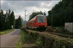 RB56  DER ISERLOHNER  von Iserlohn nach Hagen Hbf, geschoben von der 143 840 fhrt bei Hohenlimburg dem Ziel entgegen.