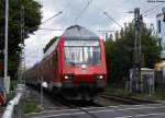 Der RE10418 mit Schublok 111 155 nach Aachen am Bü kurz vor dem Bahnhof Geilenkirchen, Gruß an die Lokführerin! 6.9.09