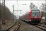 Der RE4 nach Dortmund in der Einfahrt des Geilenkirchener Bahnhofs, Schublok war die 111 129-3.