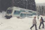 Doppelstock-Steuerwagen zweite Ausfhrung nach der Wende ohne Klimaanlage im April 1996 in Feldberg-Brental, Deutschlands hchstgelegenen DB-Bahnhof, Strecke Freiburg - Seebruck, landschaftlich sehr Schn, vor allem im Winter.