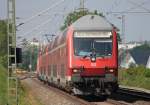 RE10415 nach Dortmund mit Schublok 111 119 am Km 28.8 zwischen Geilenkirchen und Lindern, 22.5.10