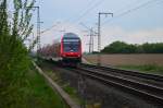 Aus Aachen kommend ist dieser RE 4 Zug steuerwagenvoraus gegen 19:00 Uhr unweit des Bü Dahler Weg in Wickrath auf seinem Weg nach Dortmund von mir abgelichtet.