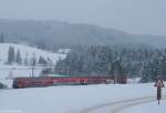 RB 31598 (Seebrugg-Freiburg(Breisg au) Hbf) mit Schublok 143 332-5 bei Hinterzarten 19.12.09