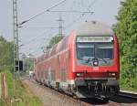 RE10417 mit Schublok 111 153 aus Aachen nach Dortmund am Km 28.8 bei Geilenkirchen, 22.5.10