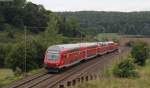 RE 19215 (Mosbach-Neckarelz-Ulm Hbf) mit Schublok 146 213-4 bei Urspring 31.8.12