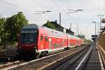 Ausfahrt von D-DB 50 80 80-35 301-6 am 17.04.2014 als HVZ-Verstärker von Neuenburg (Baden) nach Freiburg (Brsg) Hbf in Müllheim (Baden).