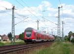 Durch Zufall endeckte ich, dass der RE2 nach Wittenberge heute in umgekehrter Reihenfolge fuhr. Somit sah man diese Raritt, mit dem  Oldenburger Steuerwagen , hier bei der Ausfahrt aus dem Bahnhof von Lbbenau/Spreewald. 05.06.2009