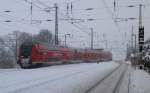 Mit reichlich Versptung kam hier ein Umleiter-RE2 von Cottbus nach Berlin Hbf(tief) durch den Bahnhof von Baruth(Mark) gefahren.