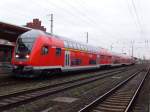 Neuer Regionalexpress mit Schublok 112 132 am 04.02.2011 in Stendal.