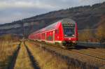 Ein RE Frankfurt Hbf - Wrzburg Hbf ist am 02.01.2013 bei Thngersheim unterwegs. 