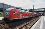 Hier ein RE3 (RE18314) von Elsterwerda nach Stralsund Hbf., bei der Ausfahrt am 27.6.2014 aus Berlin Gesundbrunnen.