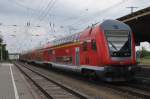 Hier ein RE5 (RE18512) von Falkenberg(Elster) nach Stralsund Hbf., bei der Ausfahrt am 12.7.2014 aus Falkenberg(Elster).