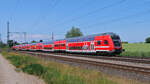 Nachschuss auf einen RE5 Berlin-Südkreuz - Rostock Hbf kurz vor der Durchfahrt durch Kavelstorf.