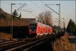 RB27 (RB 12574)  Rhein-Erft-Bahn  geschoben von der 143 025 ist bei Leutesdorf auf der Fahrt Richtung K�ln Hauptbahnhof. (09.02.2008)
