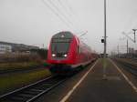 RE 21421 von L�beck Hbf nach Hamburg Hbf bei der Ausfahrt in Bad Oldesloe am 6.12.08.