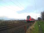 Nachschuss auf den RE 21568 nach Lbeck Hbf kurz vor der Einfahrt in Reinfeld (Holst.).