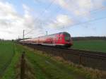 RE 21419 L�beck Hbf - Hamburg Hbf kurz nach der Ausfahrt aus Reinfeld (Holst.) am 19.12.08.