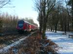 Der Regionalexpress Nordeich-Mole - Hannover Hbf am 10.1.2009 zwischen Bad Zwischenahn und Oldenburg.