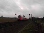 RE 21420 Hamburg Hbf - L�beck Hbf kurz nach der Ausfahrt aus Reinfeld (Holst.) am 24.01.09.