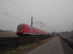 RE 21570 Hamburg Hbf - L�beck Hbf ist am 26.01.09 kurz nach der Ausfahrt aus Reinfeld (Holst.) bei Altenfelde Richtung L�beck unterwegs.