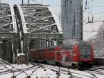 Der RE 5 nach Emmerich am 05.01.2009 bei der Ausfahrt aus dem Klner Hbf.