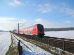 RE 21420 Hamburg Hbf - L�beck Hbf rast am 14.02.09 durch die sch�n verschneite Winterlandschaft bei Reinfeld (Holst.).