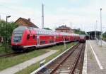Hier mal alles in einem Bild. Vlnr: RE2 nach Cottbus �ber L�bbenau/Spreewald, S46 nach Westend und ODEG nach Frankfurt/Oder �ber Beeskow. Auch sehr gut zu erkennen ist der historische Zustand des Bahnhofes. 22.05.2009