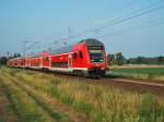 Einer der  langweiligen  REs am ist am fr�hen Morgen des 29.6.09 auf der KBS 380 Richtung Bremen unterwegs. Aufgenommen nach dem Halt in Nienburg (Weser).