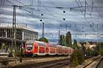 RE von Mhldorf nach Mnchen Hbf am 15.08.2010 bei der Durchfahrt durch Mnchen Heimeranplatz.