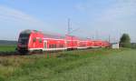 Mit Steuerwagen voraus kommt hier der RE5 von Stralsund nach Falkenberg gefahren. In wenigen Minuten wird er seinen Endbahnhof erreicht haben. Gr�fendorf den 01.07.2011