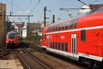 Während auf Gleis 3 der RE1 (RE18122) von Frankfurt(Oder) nach Magdeburg Hauptbahnhof Ausfahrt hat, erreicht auf Gleis 1 442 836-3 als RB14 (RB18923)  Airport-Express  von Nauen nach Berlin