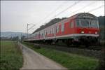 RB91 (RB 39170)  Ruhr-Sieg-Bahn  mit Schiebelok 143 290 fhrt bei Hohenlimburg nach Hagen Hauptbahnhof.