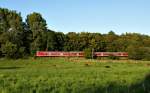 Ein RE nach Kiel Hbf am 31.07.2009 bei Kiel-Elmschenhagen.Es schiebt die nicht im Bild befindliche 218 104-8.