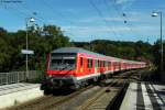 Angefhrt von einem Wittenberger Steuerwagen und geschoben von 143 882-9 passiert der RE 4933 (Stuttgart-Wrzburg ber Neckarelz) nonstop den Hp Zimmern bei Seckach.