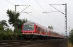 RE 12993 ist kurz nach Tagesanbruch unterwegs von Koblenz in Richtung Mainz im September 2012.