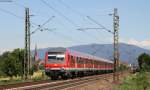 RE 26570 (Freiburg(Breisgau) Hbf-Offenburg) mit Schublok 111 050-1 bei Köndringen 13.6.14